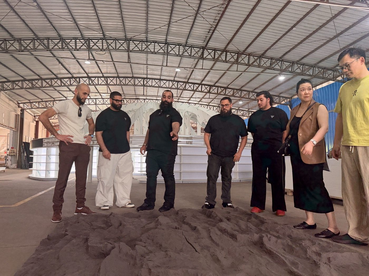 The Retail University team reviewing a fixture in the factory